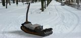Kraftig verktøy for snøtransport Snowfox beltebønder elektrisk snøscooter